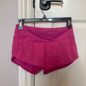 Size 2 Lululemon 2.5” inseam hot pink shorts
